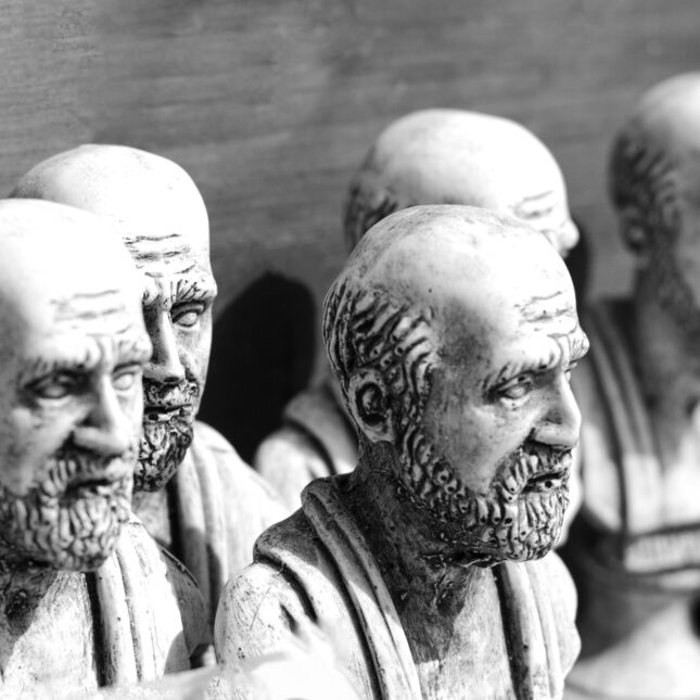 Several statues of Hippocrates line up — first opinion coverage from STAT