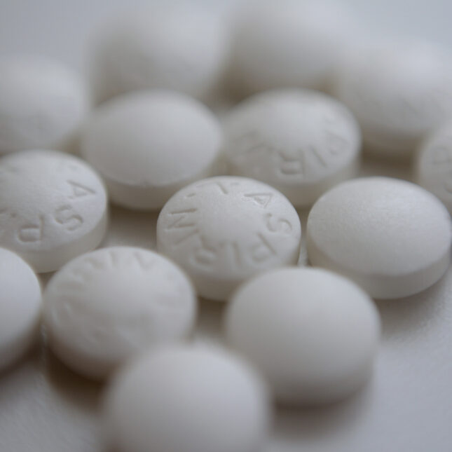 Photo of an arrangement of aspirin pills