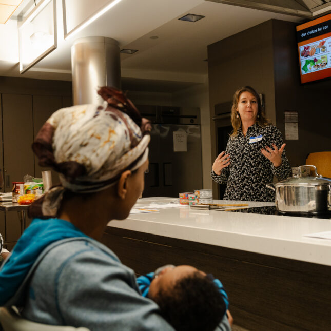GROW Clinic pediatric dietician Lisa, leads a class on anemia and how to prepare accessible, iron-rich foods in the Teaching Kitchen at Boston Medical Center. -- health coverage from STAT