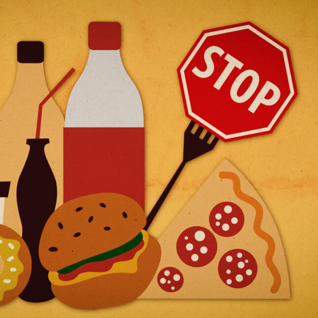 An illustration of soda, pizza, and other unhealthy foods with a STOP sign speared on a fork – health policy coverage from STAT