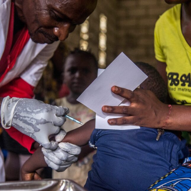 A toddler undergoes a measles vaccination at a centre in Temba, near Seke Banza, western DR Congo on March 3, 2020