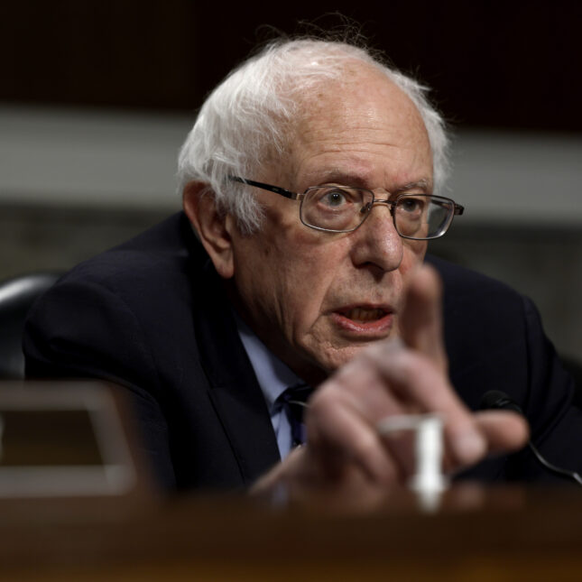 Bernie Sanders pointing his finger. -- business health coverage from STAT