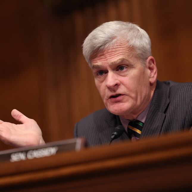 Bill Cassidy speaks with his palm facing upward during a hearing on prescription drug costs — politics coverage from STAT