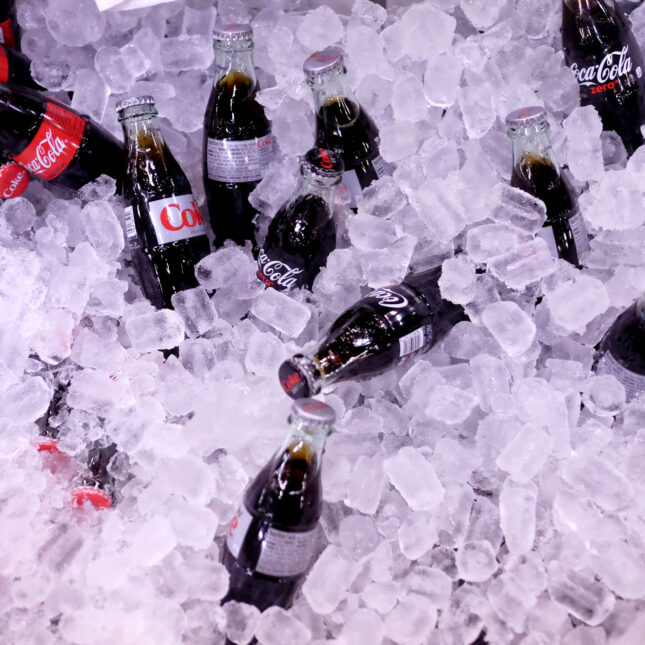 Bottles of Coke, Diet Coke, and Coke zero in a cooler full of ice – opinion coverage from STAT